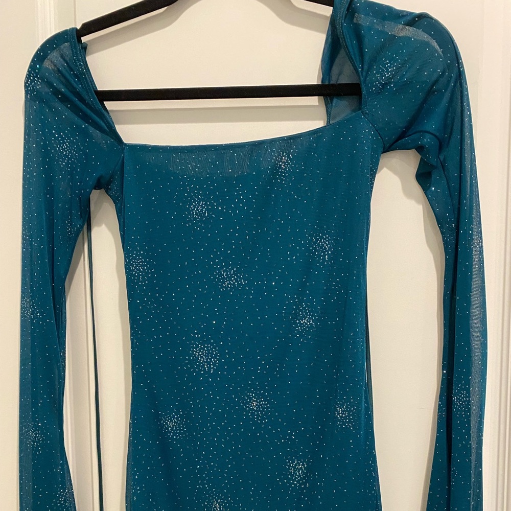 New green, glittery Lucy in the sky dress